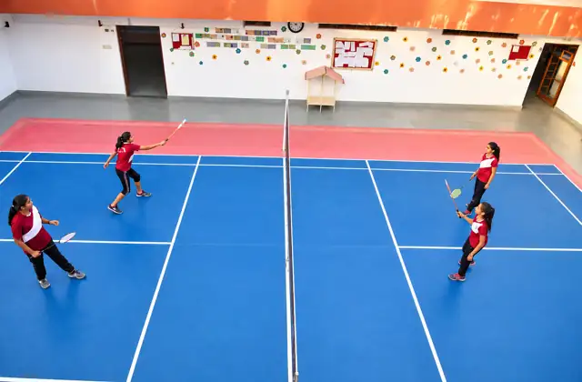 Students playing badminton at Delhi Public School Chhindwara