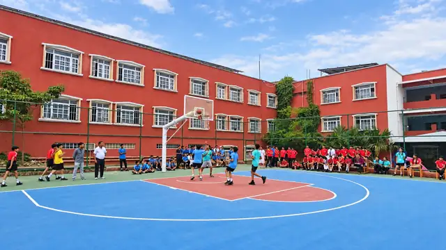 The academic block and basketball court at Delhi Public School Chhindwara