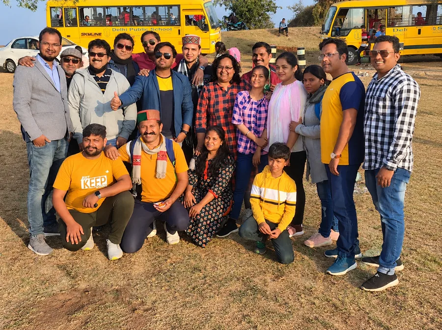 Delhi Public School Chhindwara school buses with staff and families