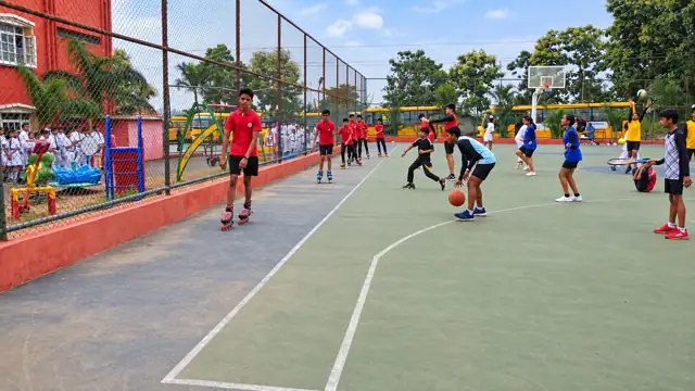 Students playing on the sports courts at Delhi Public School Chhindwara