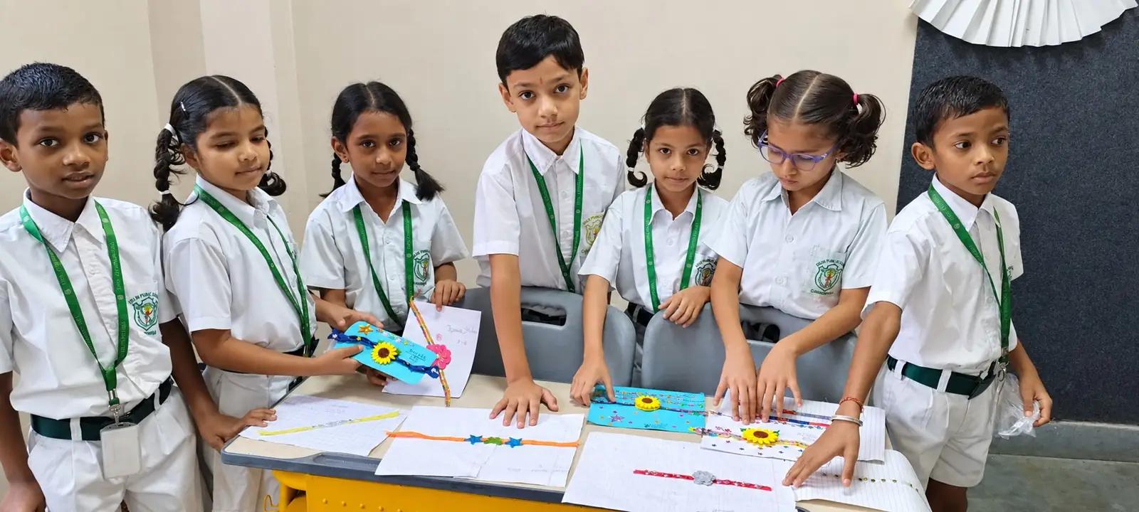 Young students presenting their class projects at DPS Chhindwara