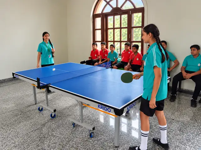 Students playing table tennis at Delhi Public School Chhindwara